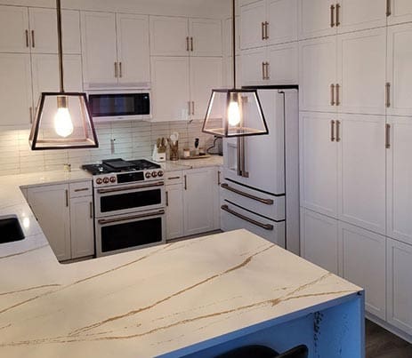 Custom vanity and tile detail in a bathroom renovation by Batzbuild