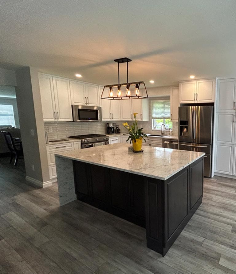 Custom kitchen cabinet layout with island and storage by Batzbuild
